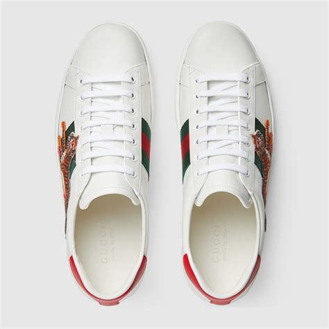 gucci new ace leather low top sneaker|Gucci ace tiger sneakers.